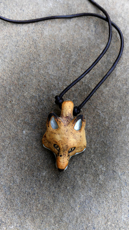 Pendentif tête de renard en céramique