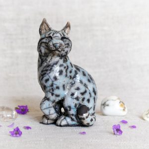 Petit lynx d&rsquo;Europe assis